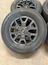 Load image into Gallery viewer, Set of OEM 17&quot; &#39;24-&#39;25 Toyota Tacoma Dark Charcoal Wheels on 245/70R17 Tires LT
