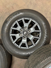 Load image into Gallery viewer, Set of OEM 17&quot; &#39;24-&#39;25 Toyota Tacoma Dark Charcoal Wheels on 245/70R17 Tires LT
