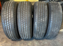 Load image into Gallery viewer, Set of 4 Lightly Used OEM &#39;24-&#39;25 Toyota Tacoma TRD Wheels 265/65R18 Michelin LT

