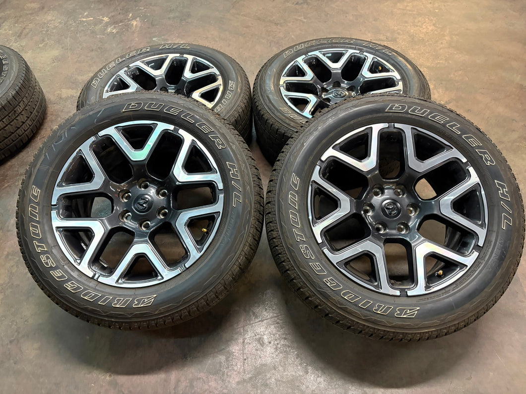 Set of 4 Used '19-'25 RAM 1500 Charcoal Machined Wheels 275/55R20 Bridgestone LT