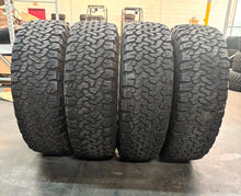Load image into Gallery viewer, Set of Four Used 17&quot; &#39;21-&#39;25 Ford Bronco Wheels on 285/70R17 BFGoodrich TAKO2 LT
