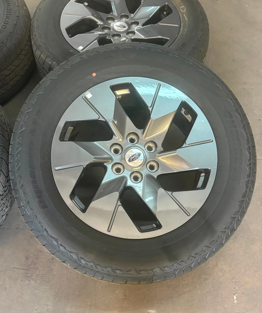 Set of 4 OEM '05-'25 Ford F-150 Lightning Wheels on 275/60R20 Hankook Tires AT2