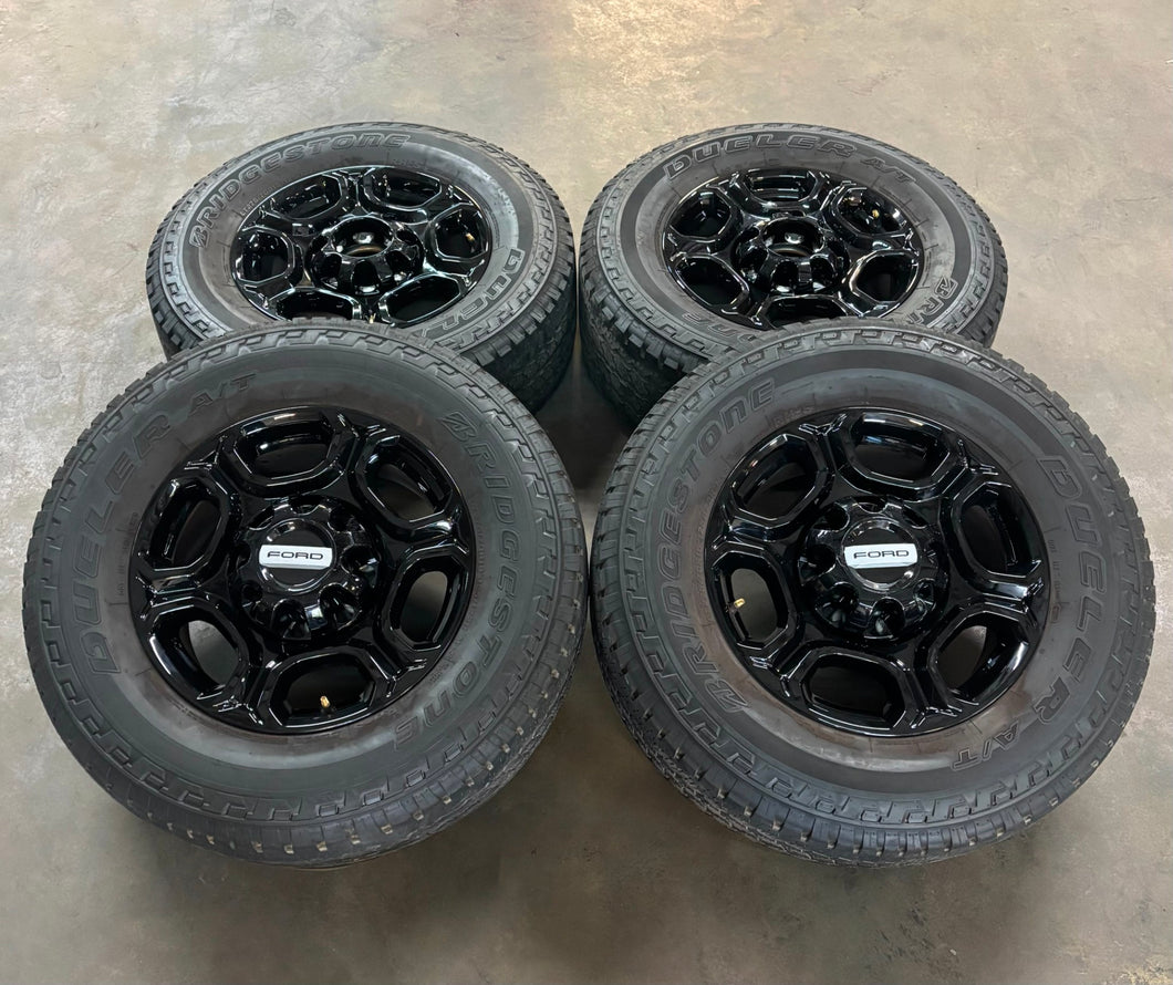 Set of 4 Used OEM '05-'25 Ford F250 F350 Black Rims 275/70R18 Bridgestone AT LT