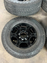 Load image into Gallery viewer, Set of 4 Used OEM &#39;05-&#39;25 Ford F250 F350 Black Rims 275/70R18 Bridgestone AT LT
