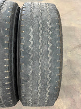 Load image into Gallery viewer, Set of 4 Used OEM &#39;05-&#39;25 Ford F250 F350 Black Rims 275/70R18 Bridgestone AT LT
