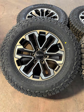 Load image into Gallery viewer, Set of &#39;00-&#39;25 Chevy Silverado 1500 Bronze Rims 275/65R18 Falken Rubitrek A/T01
