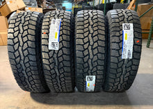 Load image into Gallery viewer, Set of &#39;00-&#39;25 Chevy Silverado 1500 Bronze Rims 275/65R18 Falken Rubitrek A/T01
