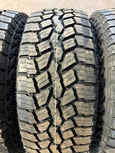 Load image into Gallery viewer, Set of &#39;00-&#39;25 Chevy Silverado 1500 Bronze Rims 275/65R18 Falken Rubitrek A/T01
