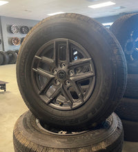Load image into Gallery viewer, Set of 4 OEM &#39;07-&#39;25 Jeep Wrangler Gladiator Wheels 245/75R17 Bridgestone Tires
