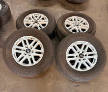 Load image into Gallery viewer, Set of Used '22-'26 Toyota Tundra 18" OEM 75281 Wheels 265/70R18 Bridgestone LT
