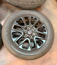 Load image into Gallery viewer, Set of Used 20" OEM '22-'26 Toyota Tundra Black Wheels 265/60R20 Bridgestone LT
