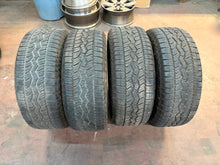 Load image into Gallery viewer, Set of Used '19-'26 RAM 1500 20" Charcoal Wheels 275/55R20 Falken AT3WA Tires LT
