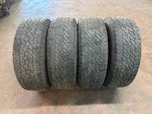 Load image into Gallery viewer, Set of 4 Used 5950 '11-'26 GMC Sierra 2500 3500 AT4 Rims 275/65R20 Goodyear E LT
