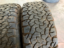 Load image into Gallery viewer, Set of Used 17" '05-'26 Ford F-150 Raptor Beadlock Wheels 37/12.50R17 BFG AT LT

