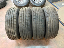 Load image into Gallery viewer, Set of Used 20" Charcoal '24-'26 Toyota Land Cruiser Wheels 265/60R20 Dunlop LT

