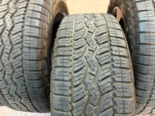 Load image into Gallery viewer, Set of Used '19-'26 RAM 1500 20" Charcoal Wheels 275/55R20 Falken AT3WA Tires LT
