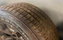 Load image into Gallery viewer, Set of Four OEM Black &#39;19-&#39;25 RAM 1500 Wheels 275/55R20 Bridgestone Alenza Tires
