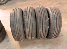 Load image into Gallery viewer, Set of Lightly Used '24-'26 Toyota Tacoma 17" OEM Rims 245/70R17 Goodyear HT LT
