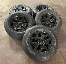 Load image into Gallery viewer, Set of 5 Used 17&quot; &#39;07-&#39;24 Jeep Wrangler Black Rims 245/75R17 Goodyear Tires LT
