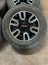 Load image into Gallery viewer, Set of 4 Used 5950 '11-'26 GMC Sierra 2500 3500 AT4 Rims 275/65R20 Goodyear E LT
