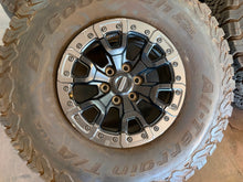 Load image into Gallery viewer, Set of Used 17" '05-'26 Ford F-150 Raptor Beadlock Wheels 37/12.50R17 BFG AT LT
