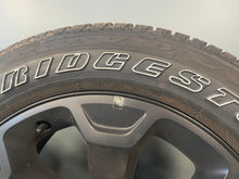 Load image into Gallery viewer, Set of Four OEM Black &#39;19-&#39;25 RAM 1500 Wheels 275/55R20 Bridgestone Alenza Tires
