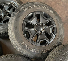 Load image into Gallery viewer, Set of 5 Used 17&quot; &#39;07-&#39;24 Jeep Wrangler Black Rims 245/75R17 Goodyear Tires LT
