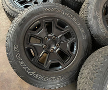 Load image into Gallery viewer, Set of 5 Used 17&quot; &#39;07-&#39;24 Jeep Wrangler Black Rims 245/75R17 Goodyear Tires LT
