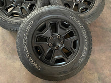 Load image into Gallery viewer, Set of 5 Used 17&quot; &#39;07-&#39;24 Jeep Wrangler Black Rims 245/75R17 Goodyear Tires LT
