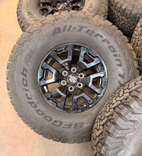 Load image into Gallery viewer, Set of 5 Used 17" OEM Ford Bronco Raptor Black Rims 37/12.50R17 BFGoodrich AT LT

