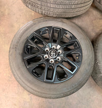 Load image into Gallery viewer, Set of 4 Used '22-'26 Toyota Tundra Black OEM Wheels 95295 265/60R20 Yokohama LT
