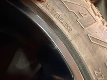 Load image into Gallery viewer, Set of 4 Used '19-'26 RAM 1500 Black OEM Wheels 275/60R20 Arroyo Tamarock A/T LT
