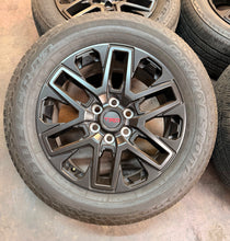 Load image into Gallery viewer, Set of Used 20" OEM '22-'26 Toyota Tundra Black Wheels 265/60R20 Bridgestone LT
