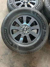 Load image into Gallery viewer, Set of Used OEM '18" '24-26 Toyota Land Cruiser Wheels 265/70R18 Michelin LTX LT

