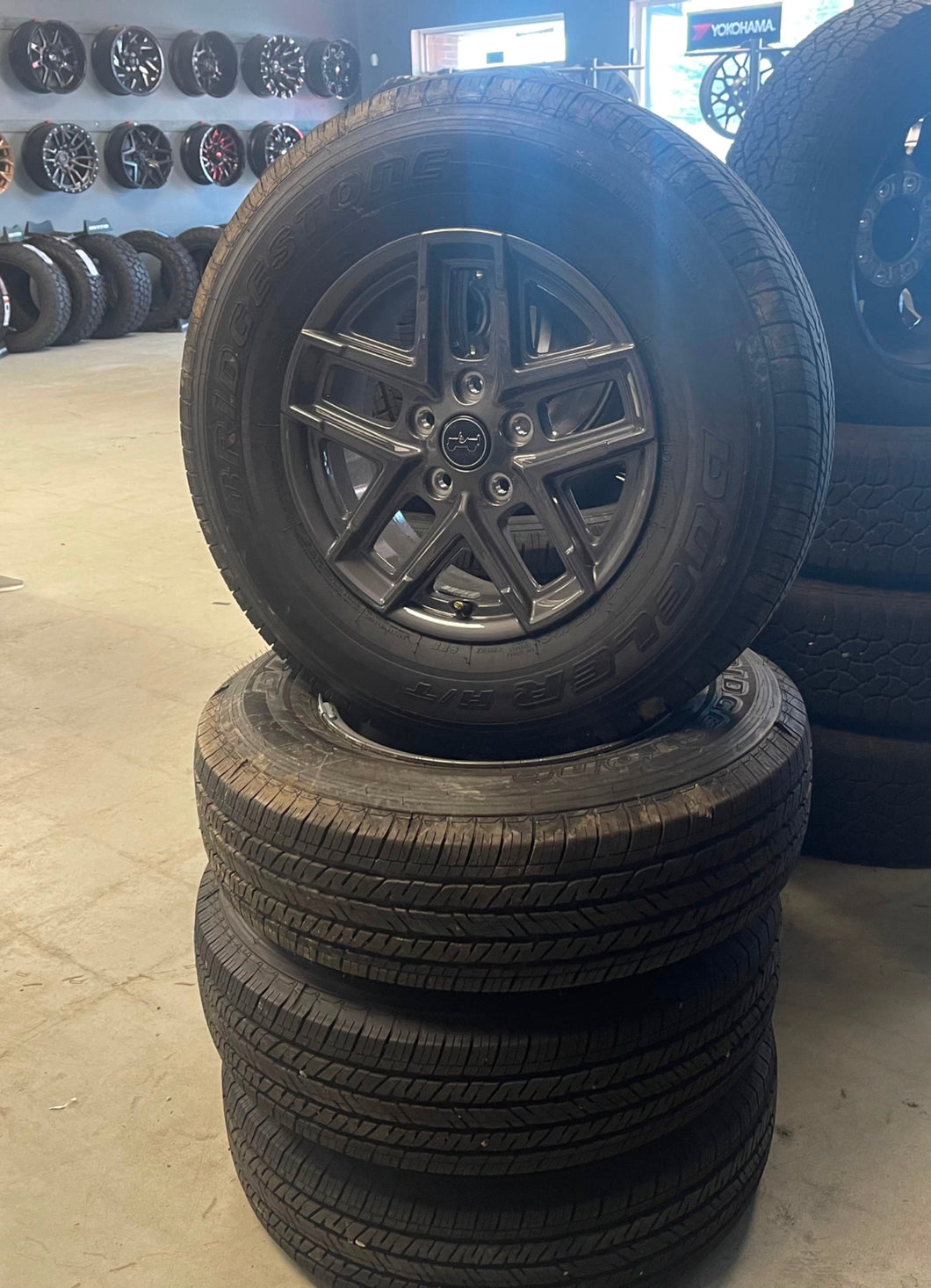 Set of 4 OEM '07-'25 Jeep Wrangler Gladiator Wheels 245/75R17 Bridgestone Tires