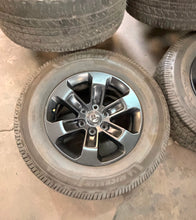 Load image into Gallery viewer, Set of 4 Used 2672 18" Black '19-'26 RAM 1500 Wheels 275/65R18 Goodyear Tires LT

