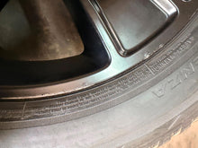 Load image into Gallery viewer, Set of Used 20" Black '19-'26 RAM 1500 2676 Wheels 275/55R20 Bridgestone H/L LT
