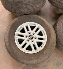 Load image into Gallery viewer, Set of Used '22-'26 Toyota Tundra 18" OEM 75281 Wheels 265/70R18 Bridgestone LT
