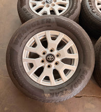 Load image into Gallery viewer, Lightly Used Set of '24-'26 Toyota Tacoma 17" OEM Rims 245/70R17 Goodyear HT LT
