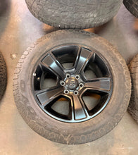 Load image into Gallery viewer, Set of 4 Used '19-'26 RAM 1500 Black OEM Wheels 275/60R20 Arroyo Tamarock A/T LT
