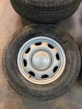 Load image into Gallery viewer, Set of 4 OEM Takeoff &#39;05-&#39;24 Ford F150 17&quot; Steel Rims on 265/70R17 Pirelli Tires
