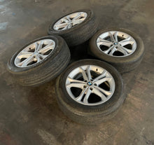 Load image into Gallery viewer, Set of Used OEM &#39;18-&#39;21 BMW X3 18&quot; Silver Rims on 225/60R18 Bridgestone Duelers
